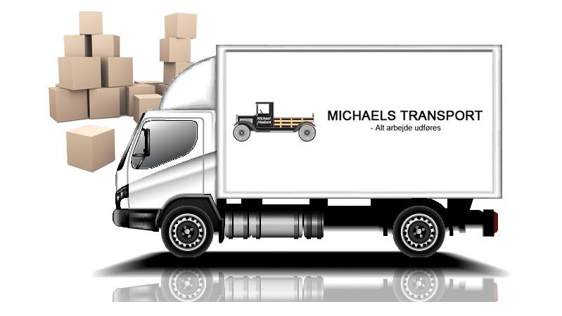 Lastbil fra Michaels Transport med kasser i baggrunden, der symboliserer fragt og transporttjenester.