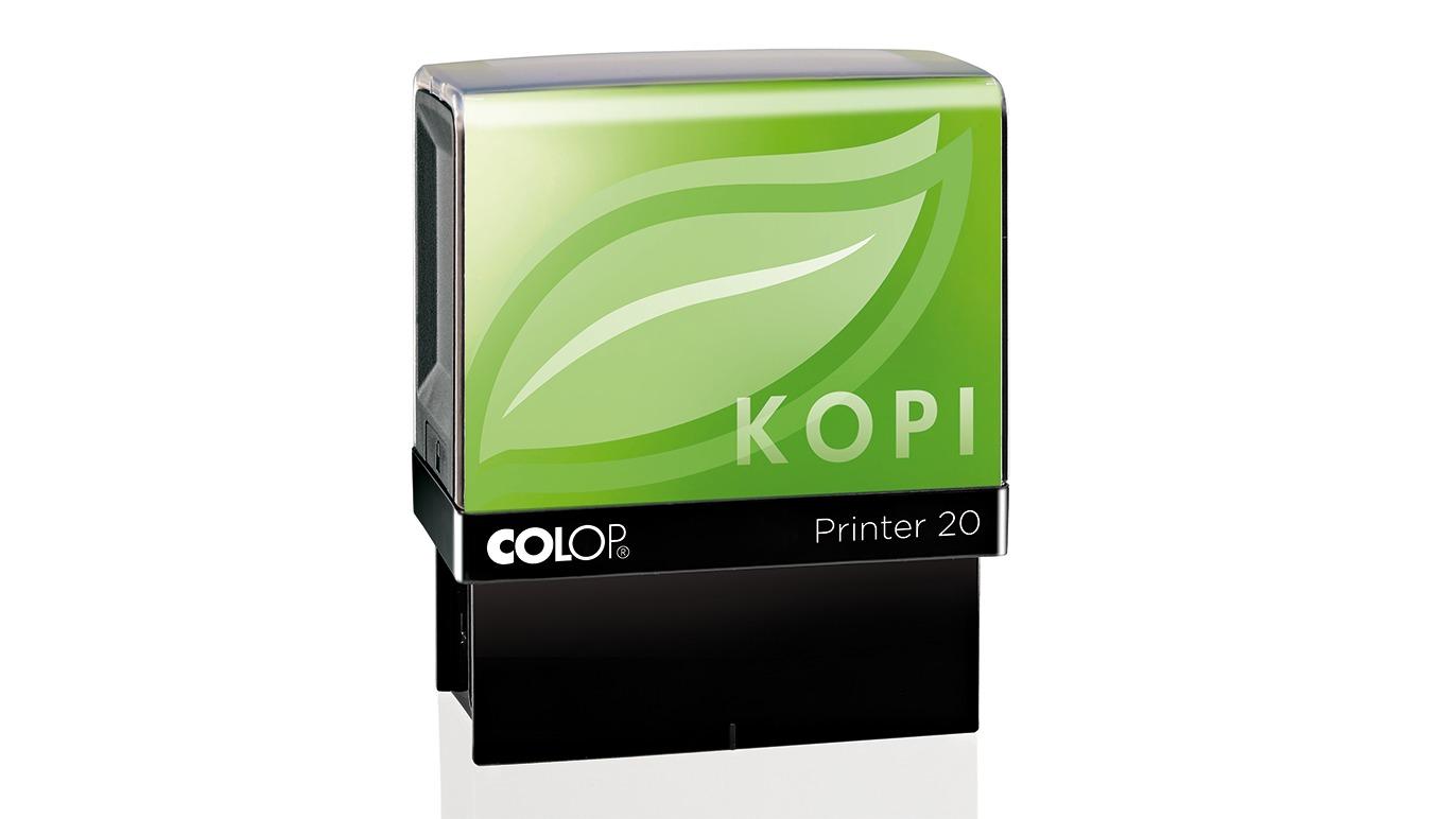 Farvet stempel med teksten "KOPI" og grønne blade på toppen, designet til brug i printere.