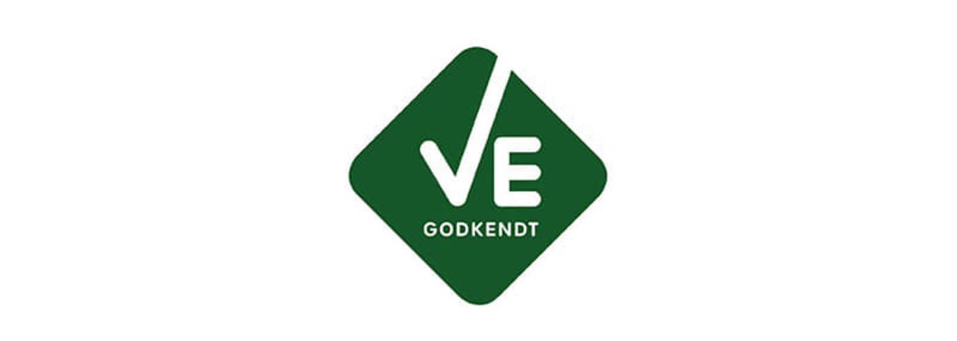Logo med teksten "VE GODKENDT" i grøn farve, indrammet i en diamantformet baggrund.
