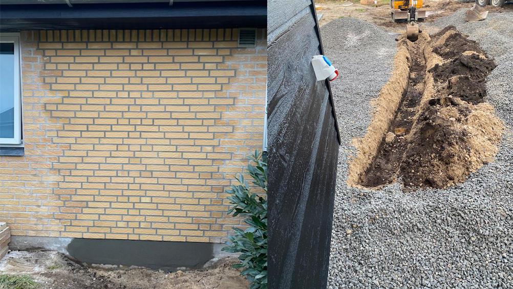 Væg med mursten og nyanlagt grusgrav til fundamentarbejde ved bygning.